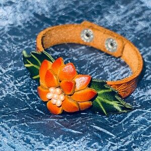 Floral Leather Bracelet with Orange and Green Accents